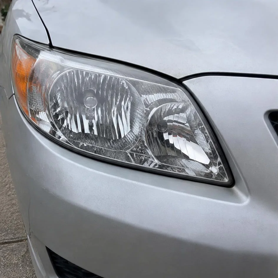 Clear automotive headlight after professional restoration in Chilliwack, BC