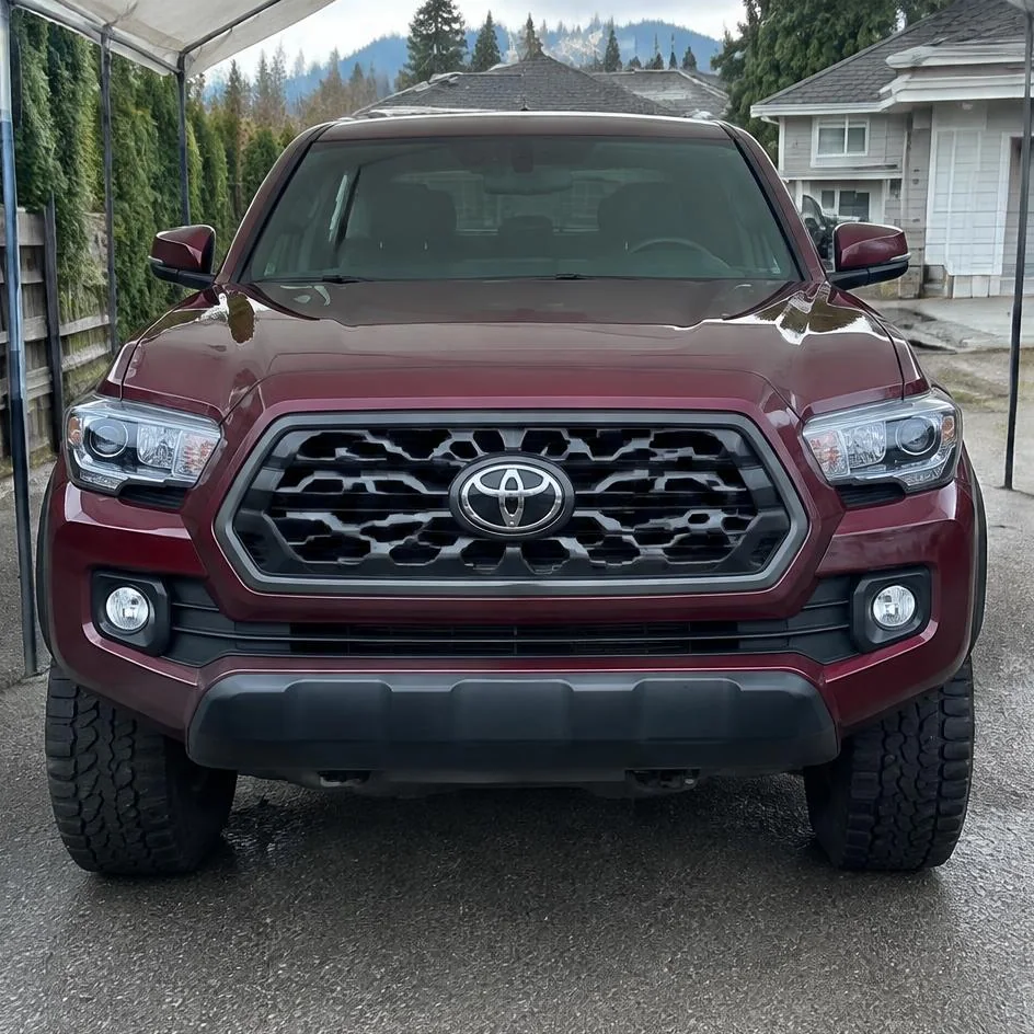 Burgundy Toyota Tacoma at a mobile appointment before paint protection film installation in Chilliwack, BC