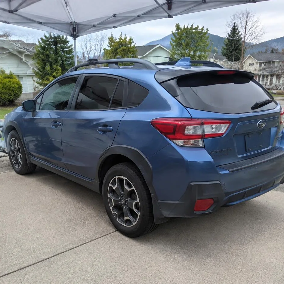 Blue crossover after automotive window tinting in Chilliwack, BC
