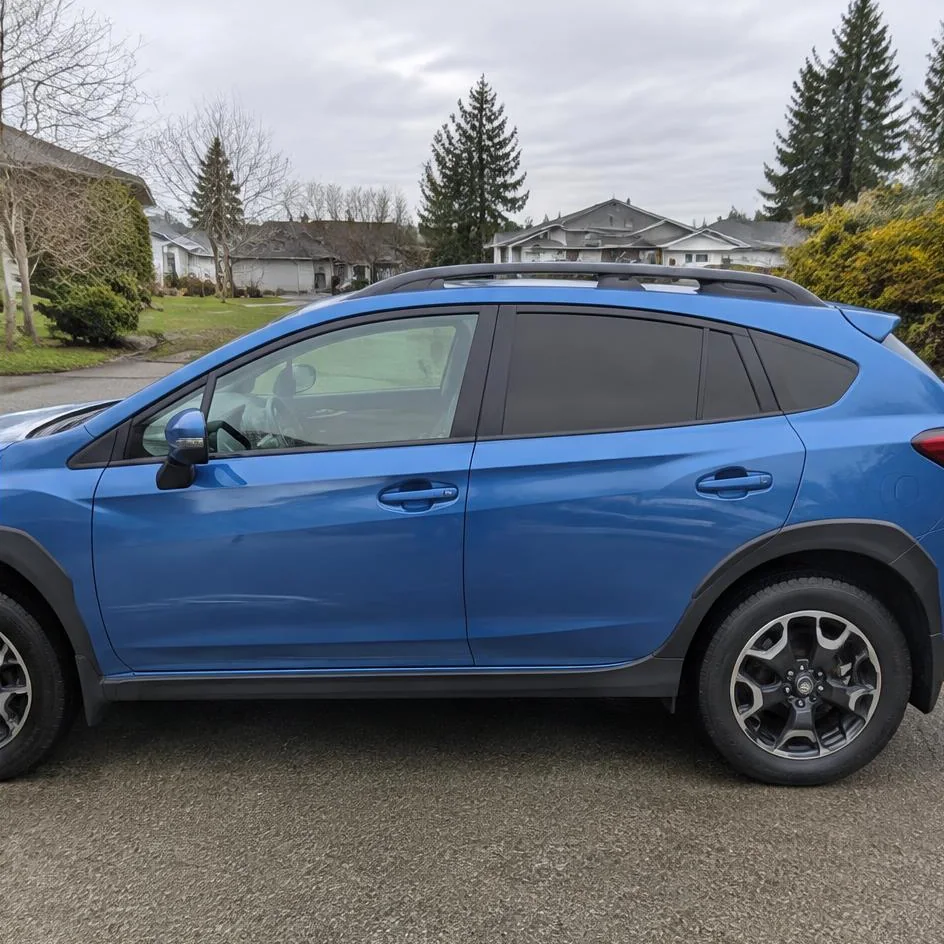Freshly tinted rear side windows on a dark SUV in Chilliwack, BC
